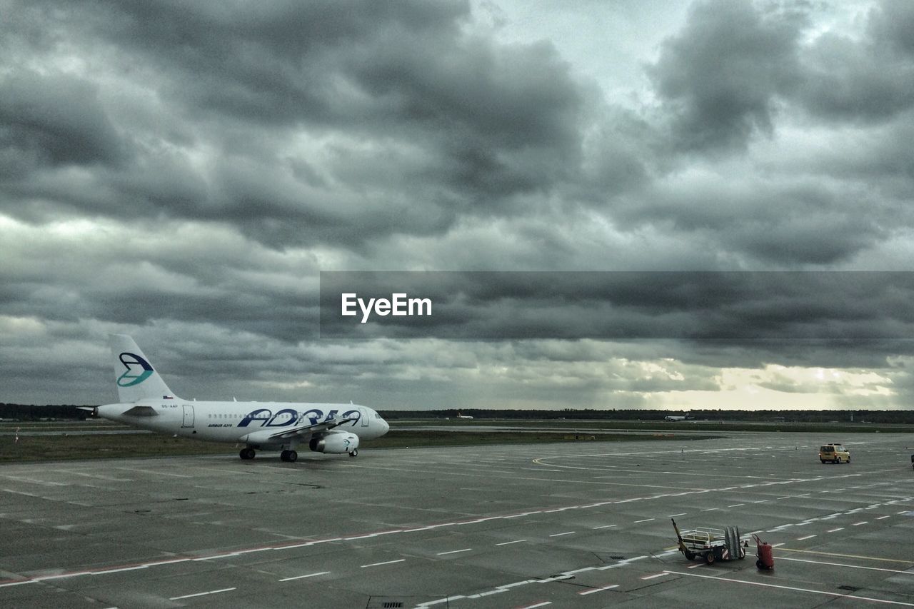 VIEW OF CLOUDY SKY OVER ROAD