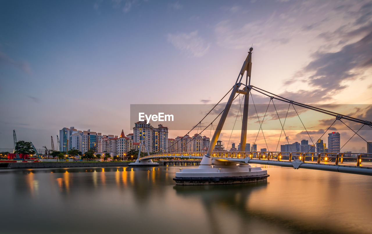 View of illuminated city at sunset