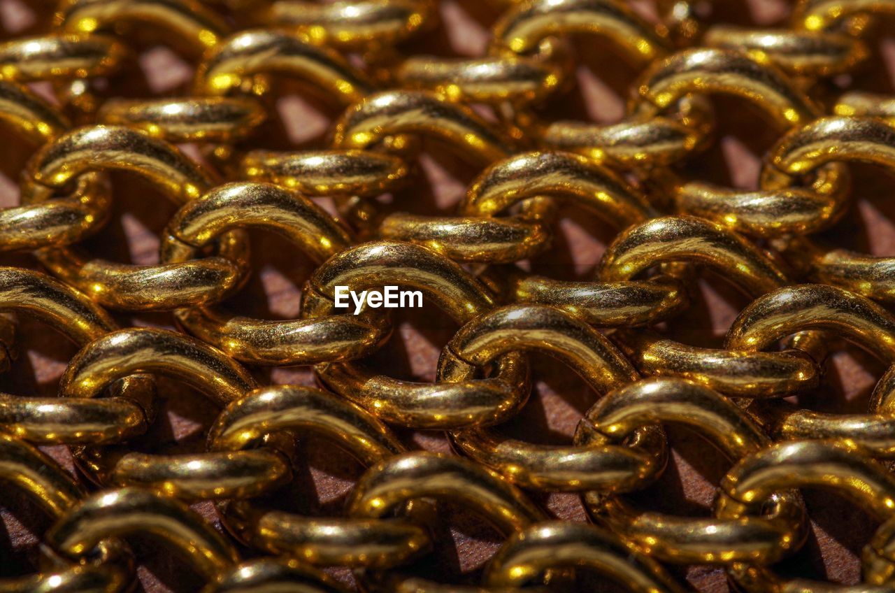 metal, backgrounds, gold, jewellery, full frame, chain, fashion accessory, no people, indoors, large group of objects, close-up, shiny, pattern