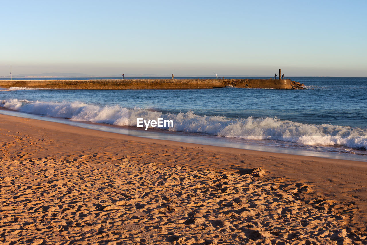 Scenic view of sea against clear sky