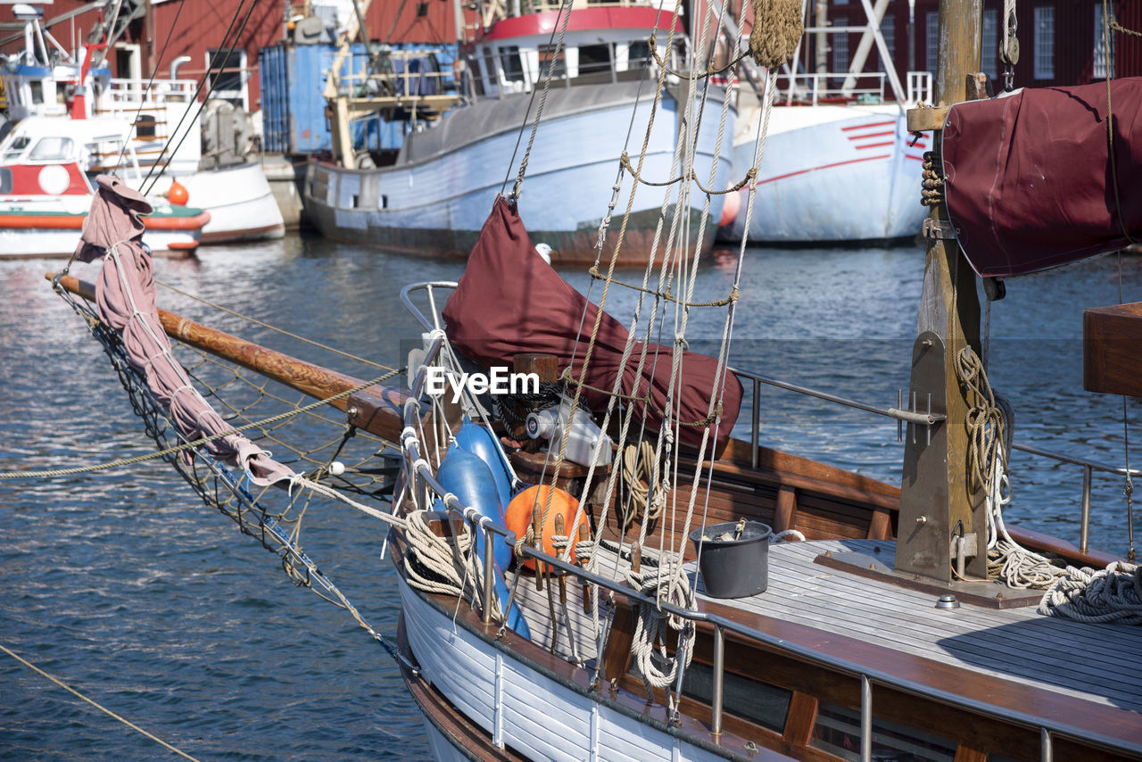 High angle view of boats moored at harbor