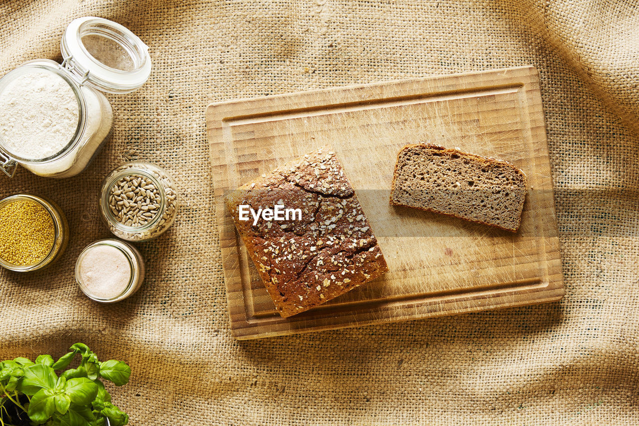 HIGH ANGLE VIEW OF BREAKFAST ON CUTTING BOARD