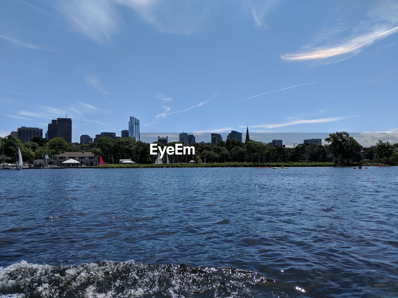 RIVER AND BUILDINGS AGAINST SKY