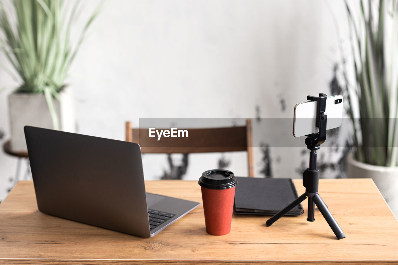 close-up of objects on table in office