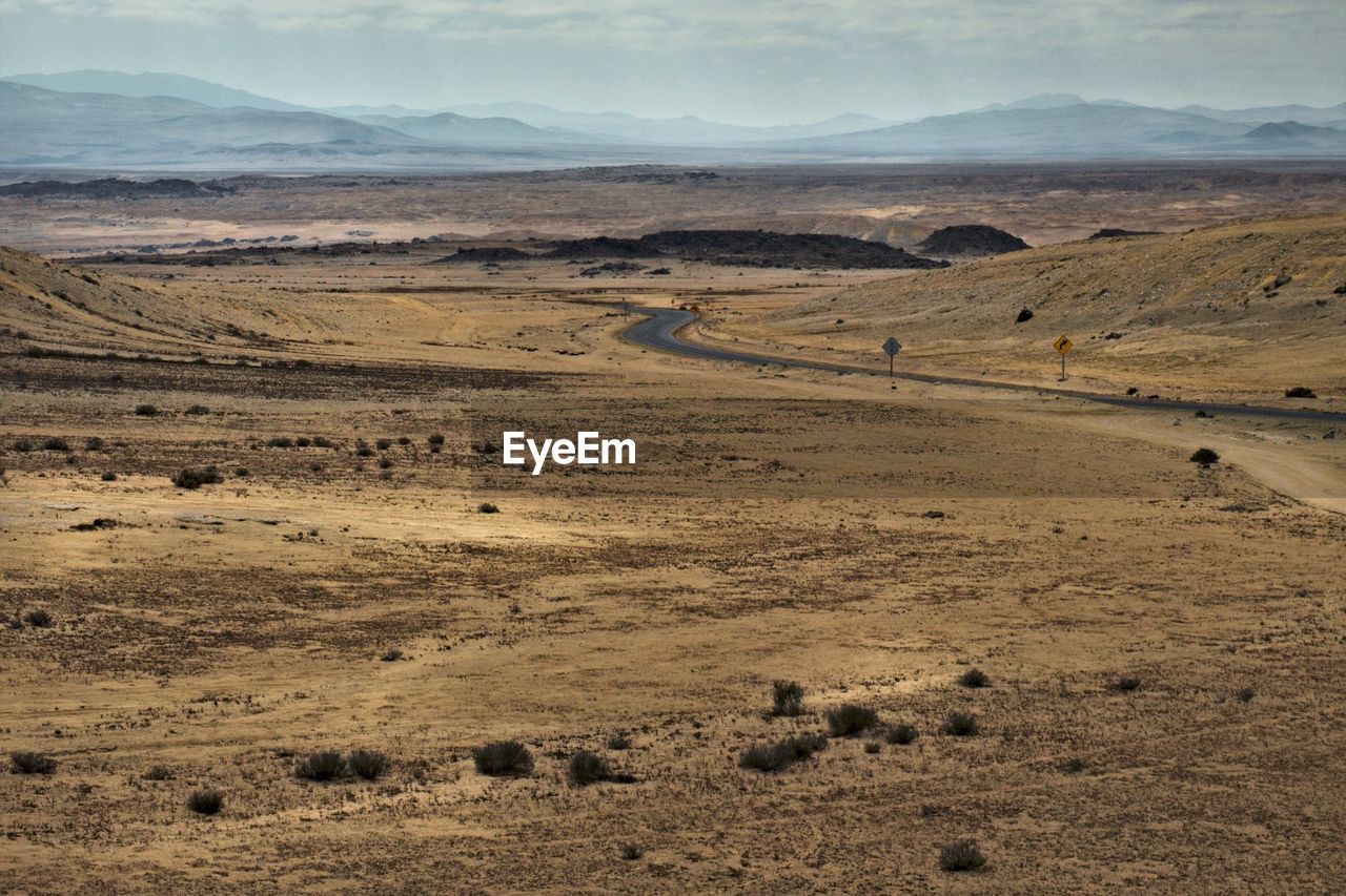 Scenic view of desert against sky