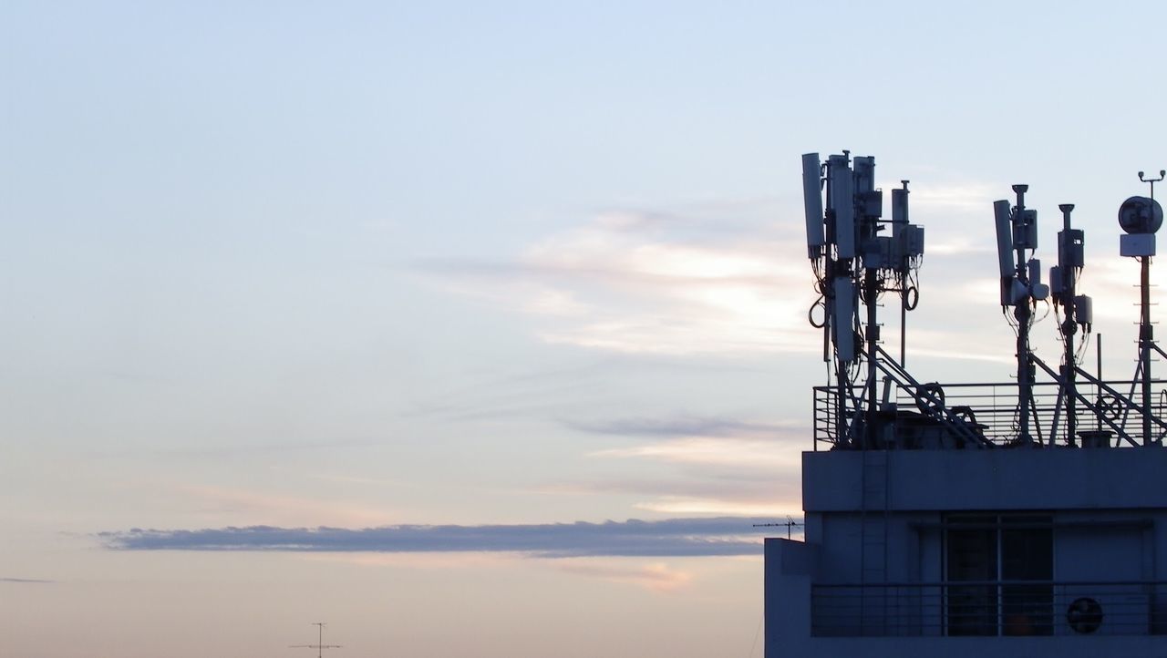 View of telecommunications equipment against sky