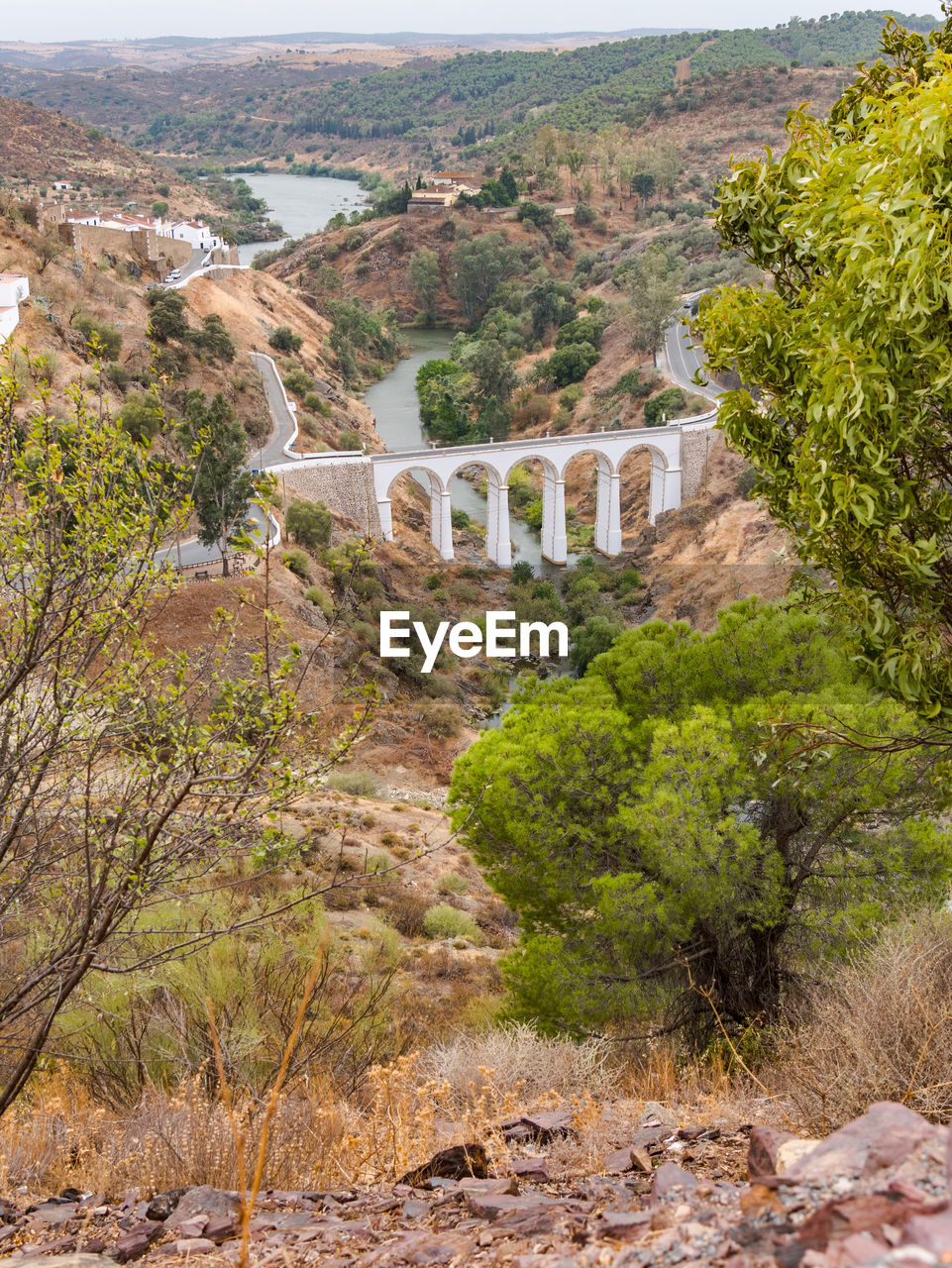 VIEW OF ARCH BRIDGE OVER MOUNTAIN