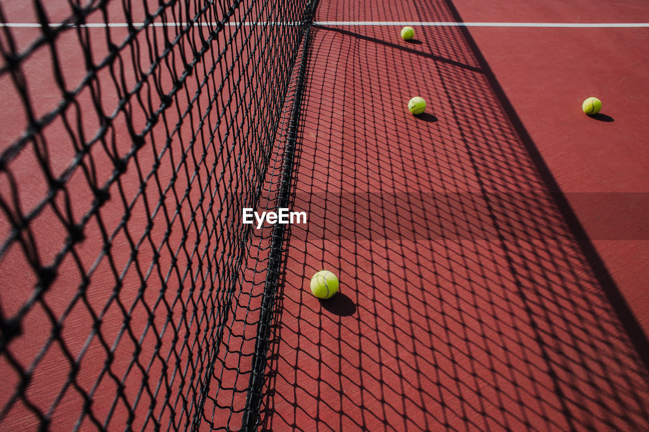 Tennis balls by net