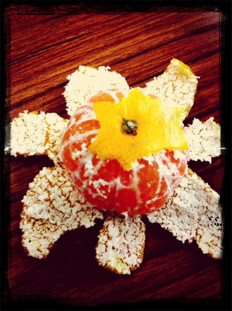 High angle view of peeled orange on table