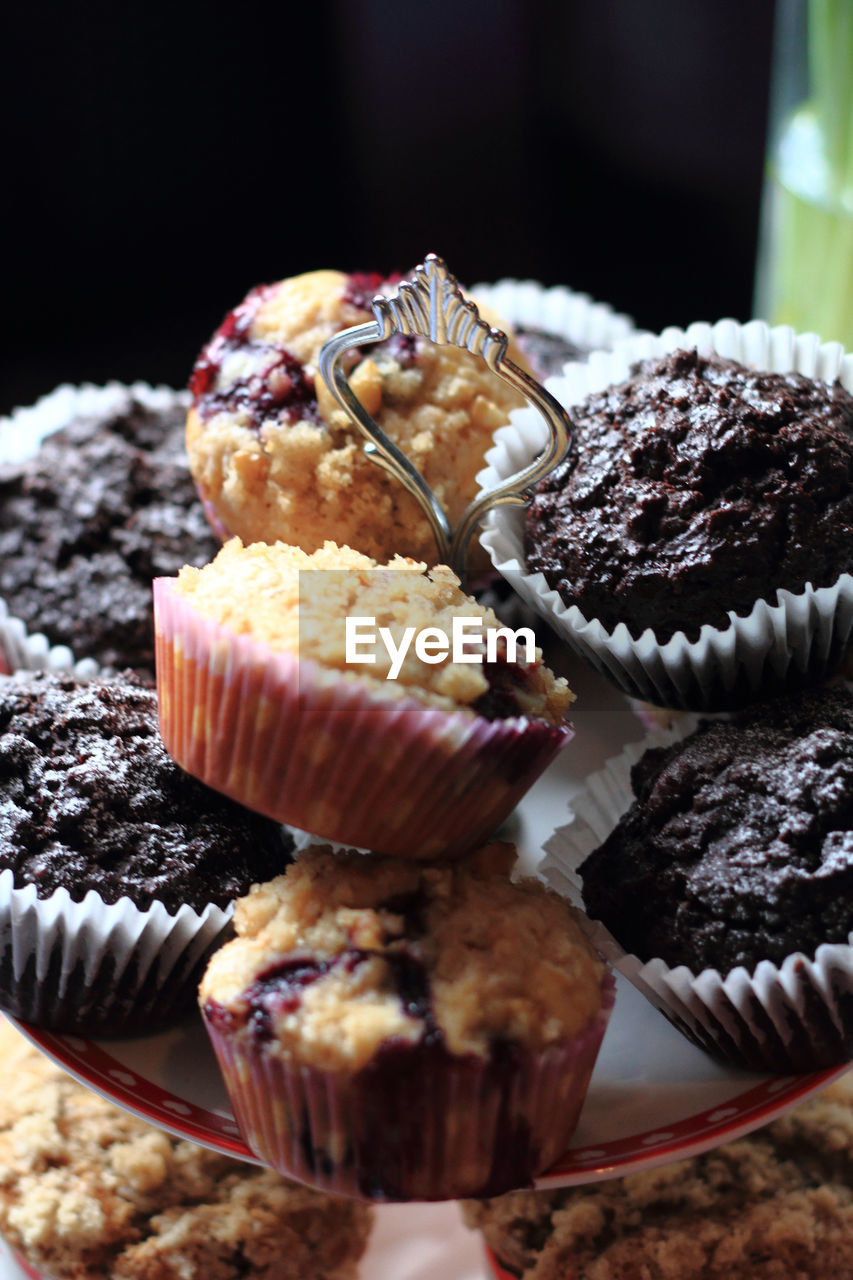 CLOSE-UP OF CUPCAKES IN CONTAINER