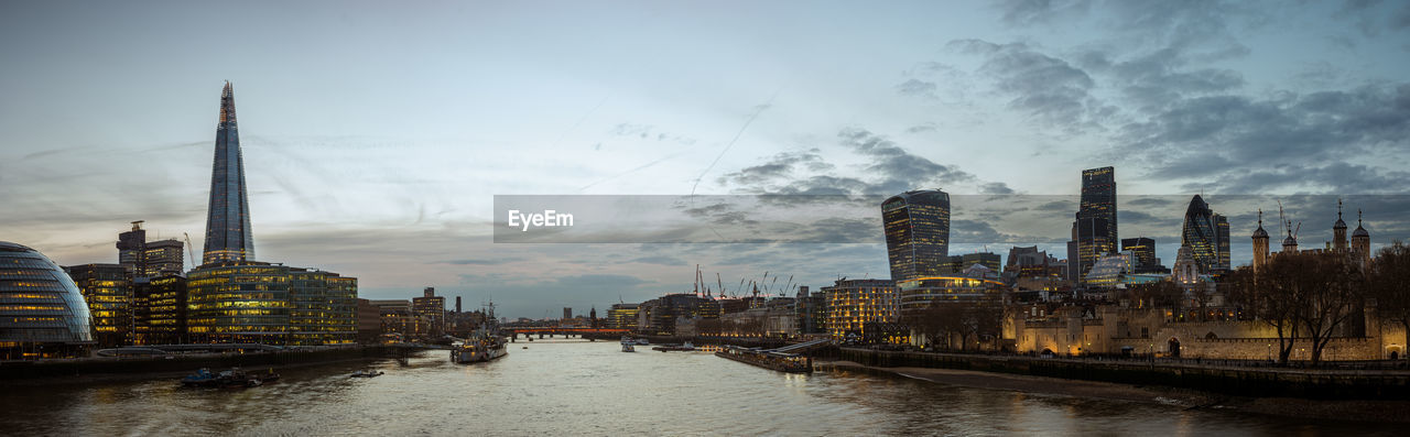 Panorama from london city hall to tower of london, from tower bridge at twilight