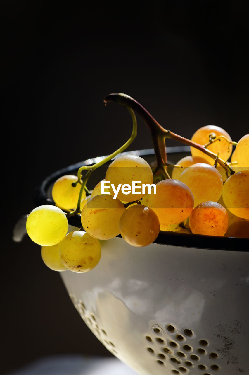 CLOSE-UP OF YELLOW FRUITS IN BOWL