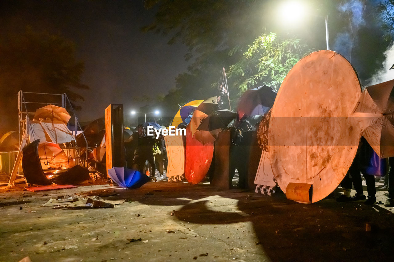 REAR VIEW OF PEOPLE AGAINST SKY