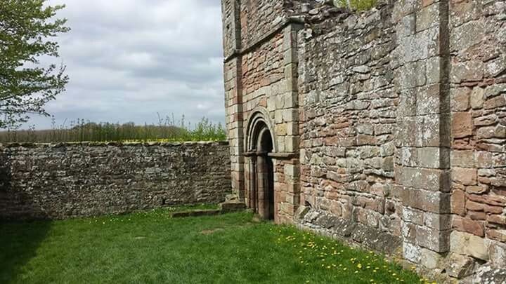 OLD BUILT STRUCTURE ON FIELD