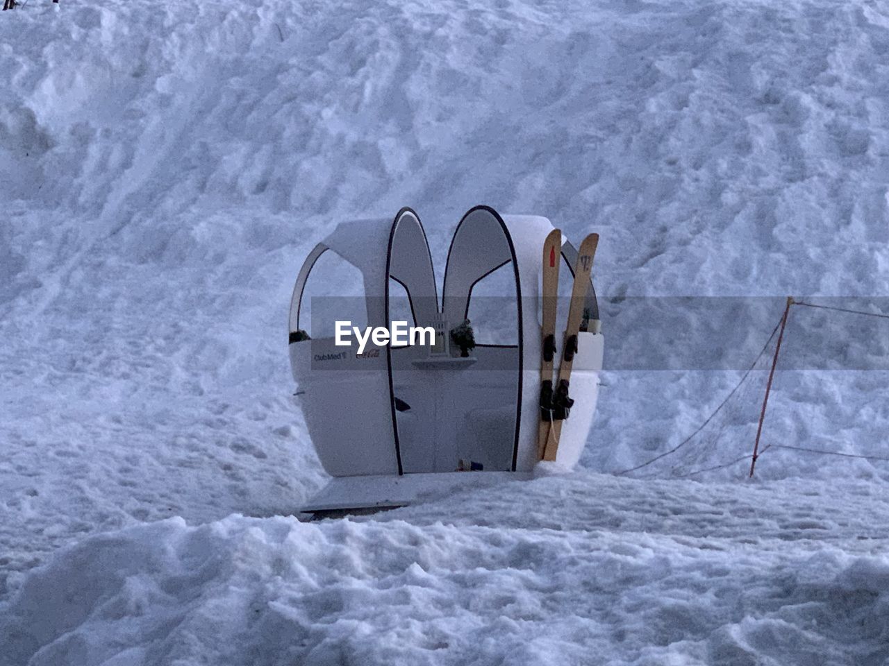 HIGH ANGLE VIEW OF SNOW COVERED LAND