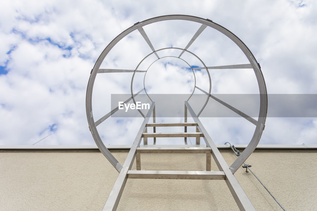 low angle view of metallic structure against sky