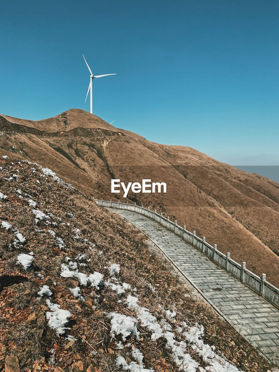 Scenic view of arid landscape against clear sky