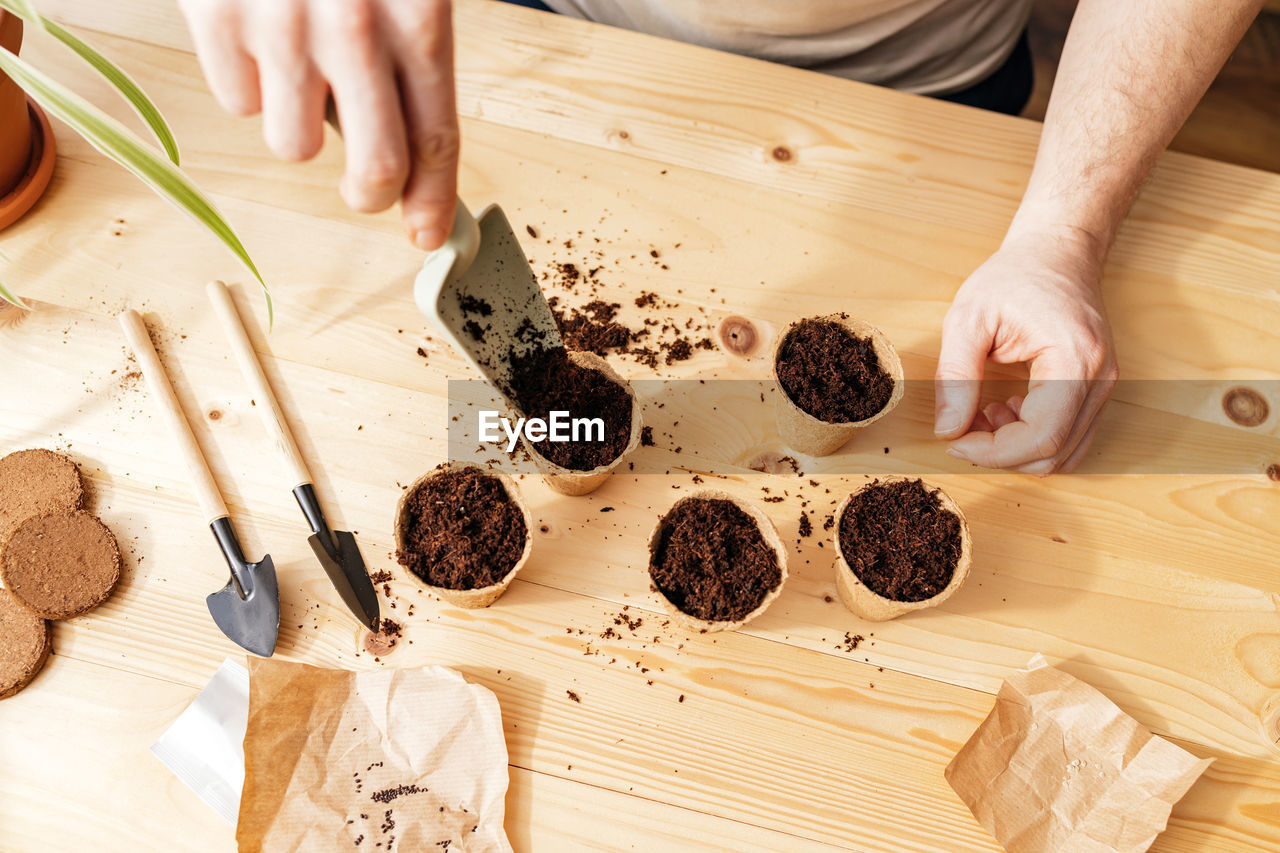 midsection of woman preparing food in kitchen