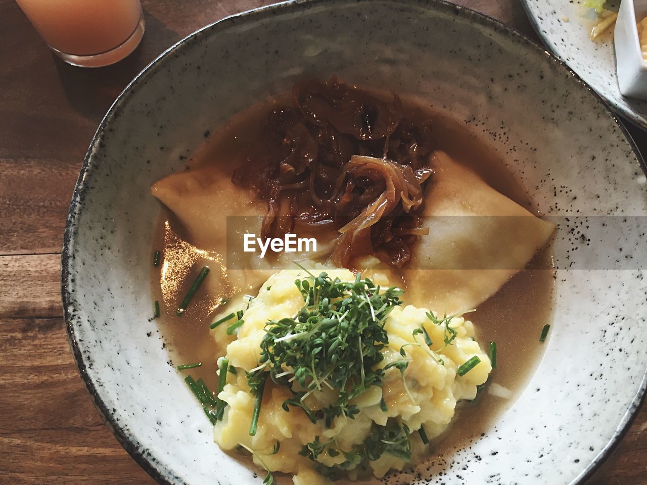 High angle view of maultaschen served in plate on table