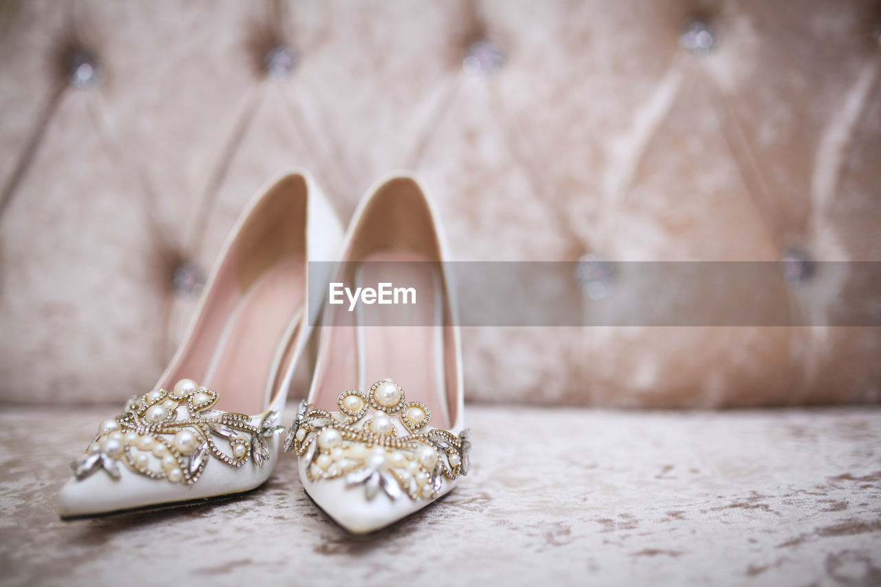 Elegant and stylish bridal shoes. selective focus.