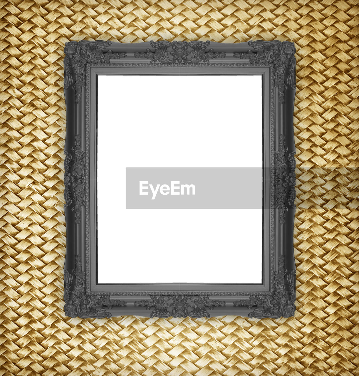 Close-up of picture frame on wooden wall