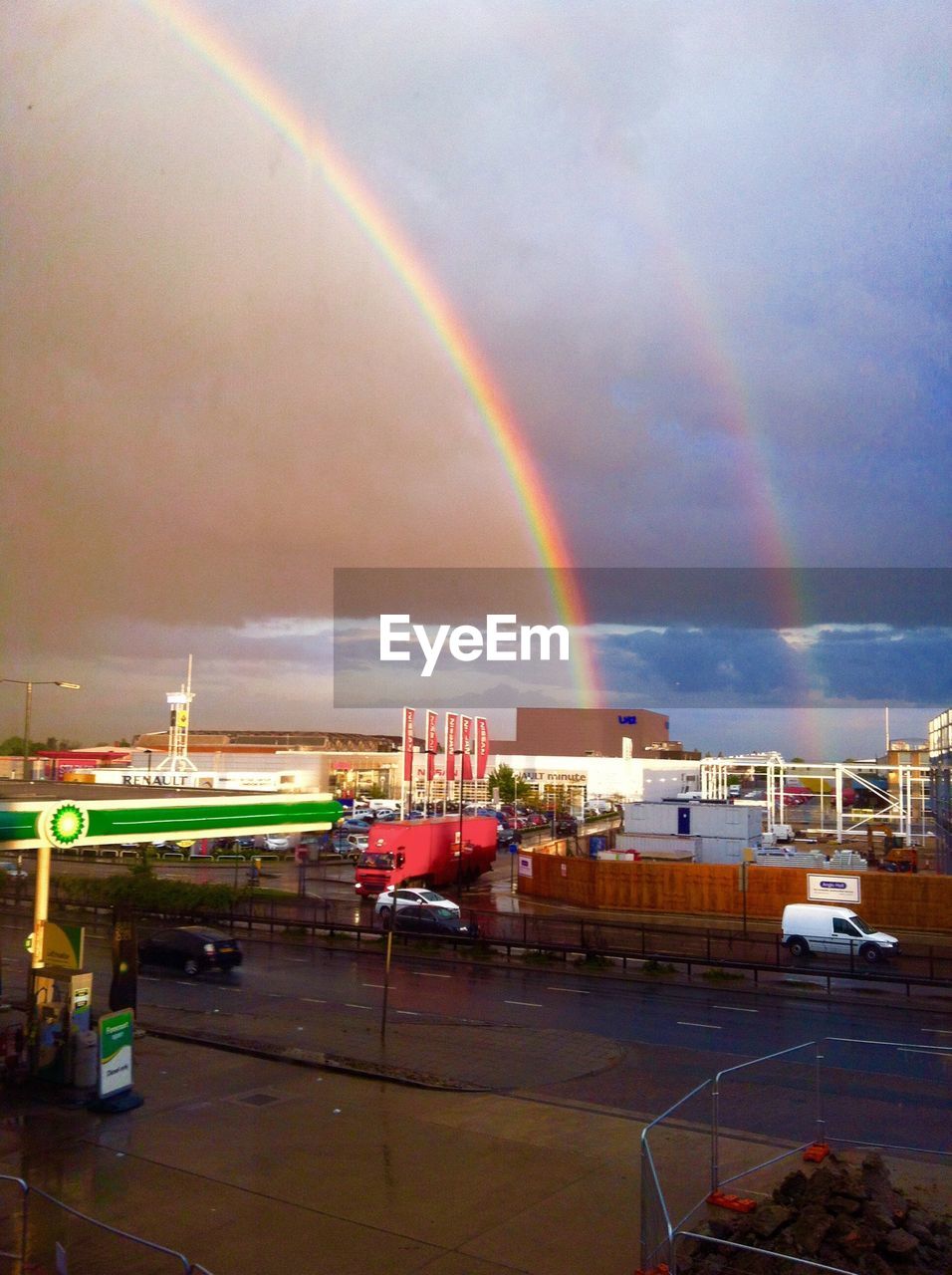 SCENIC VIEW OF RAINBOW OVER CITY