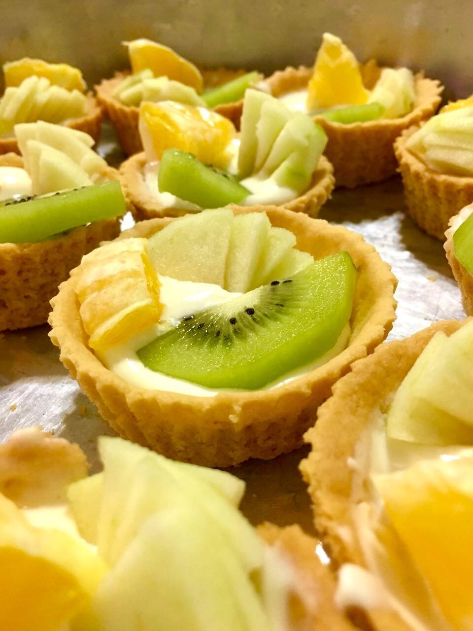 Close-up of fruit tarts on table