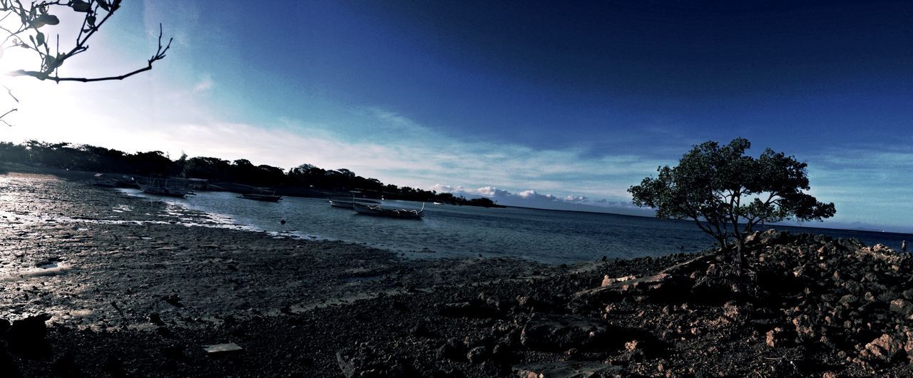 BEACH AGAINST SKY