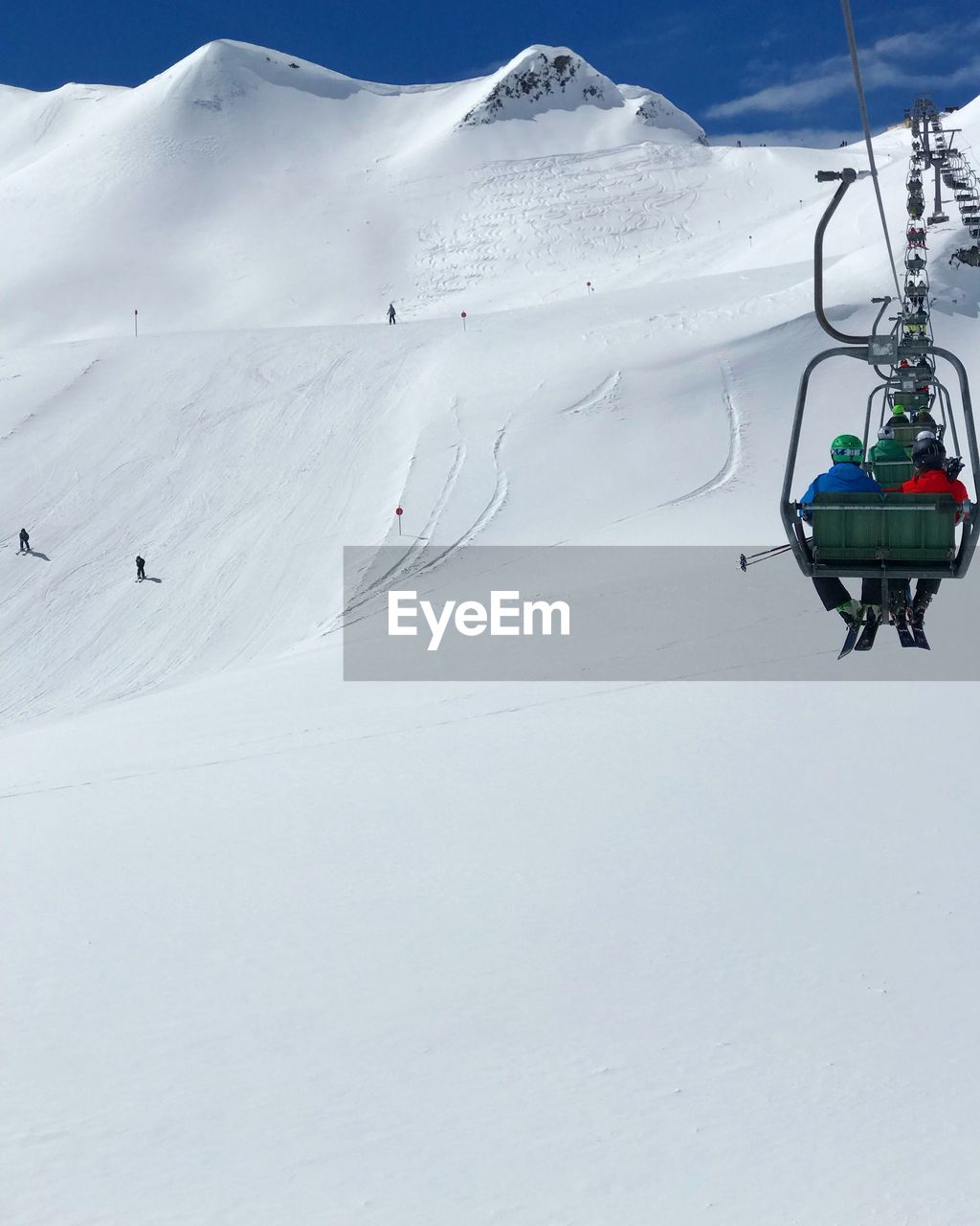 Ski lift on snowcapped mountain in lech 