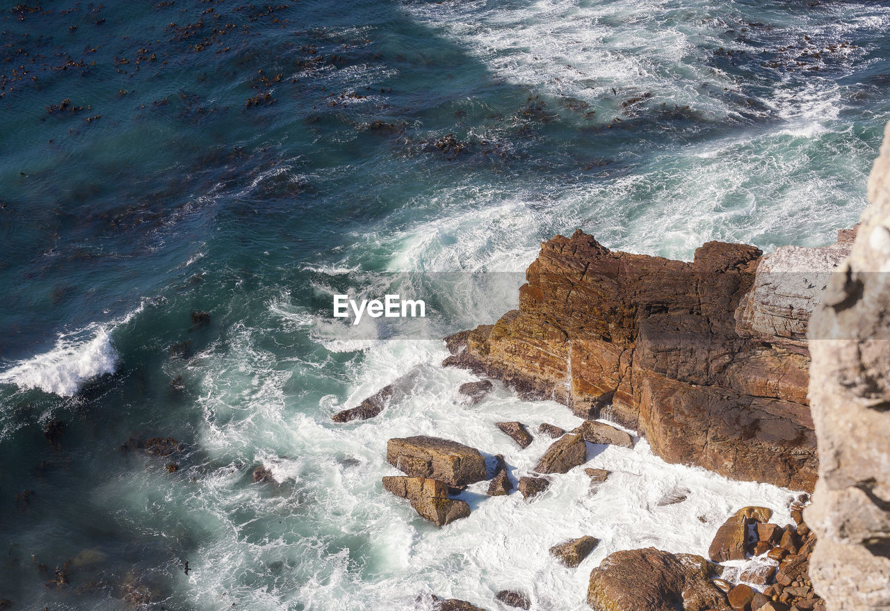 View to azure cold water of atlantic ocean from the top point of cape of good hope