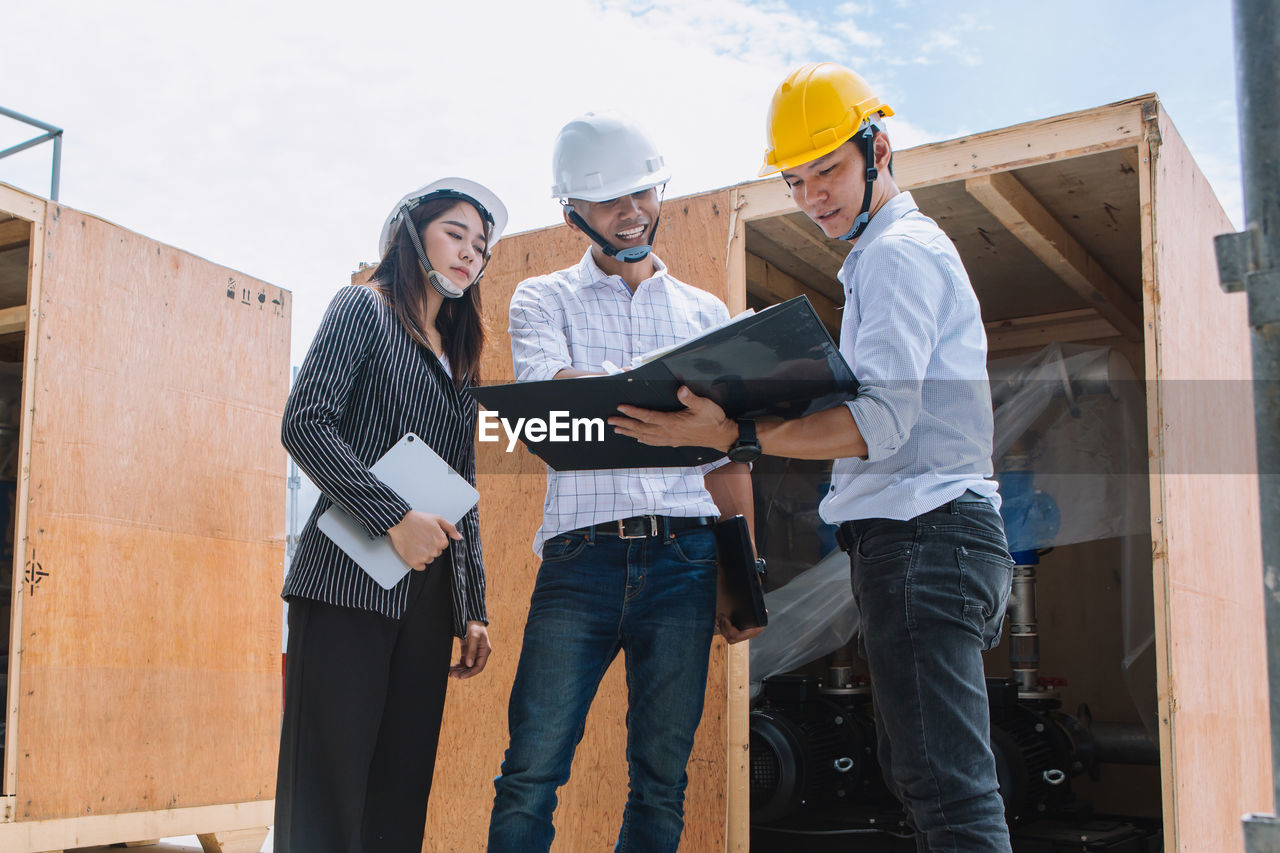 Project engineer, engineer and technician working on construction site