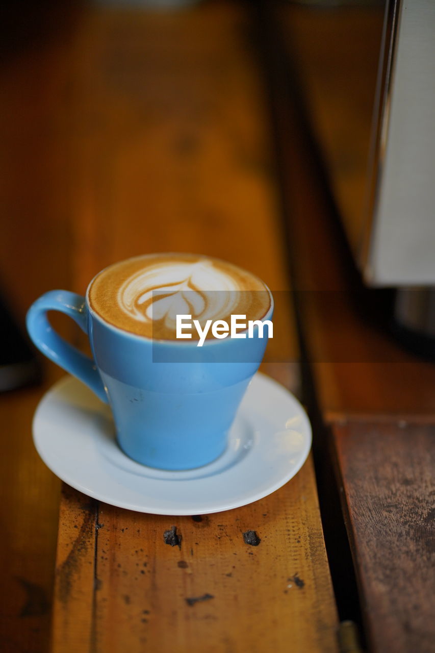 Coffee cup on table