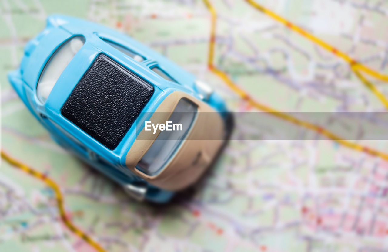 Directly above shot of toy car on map