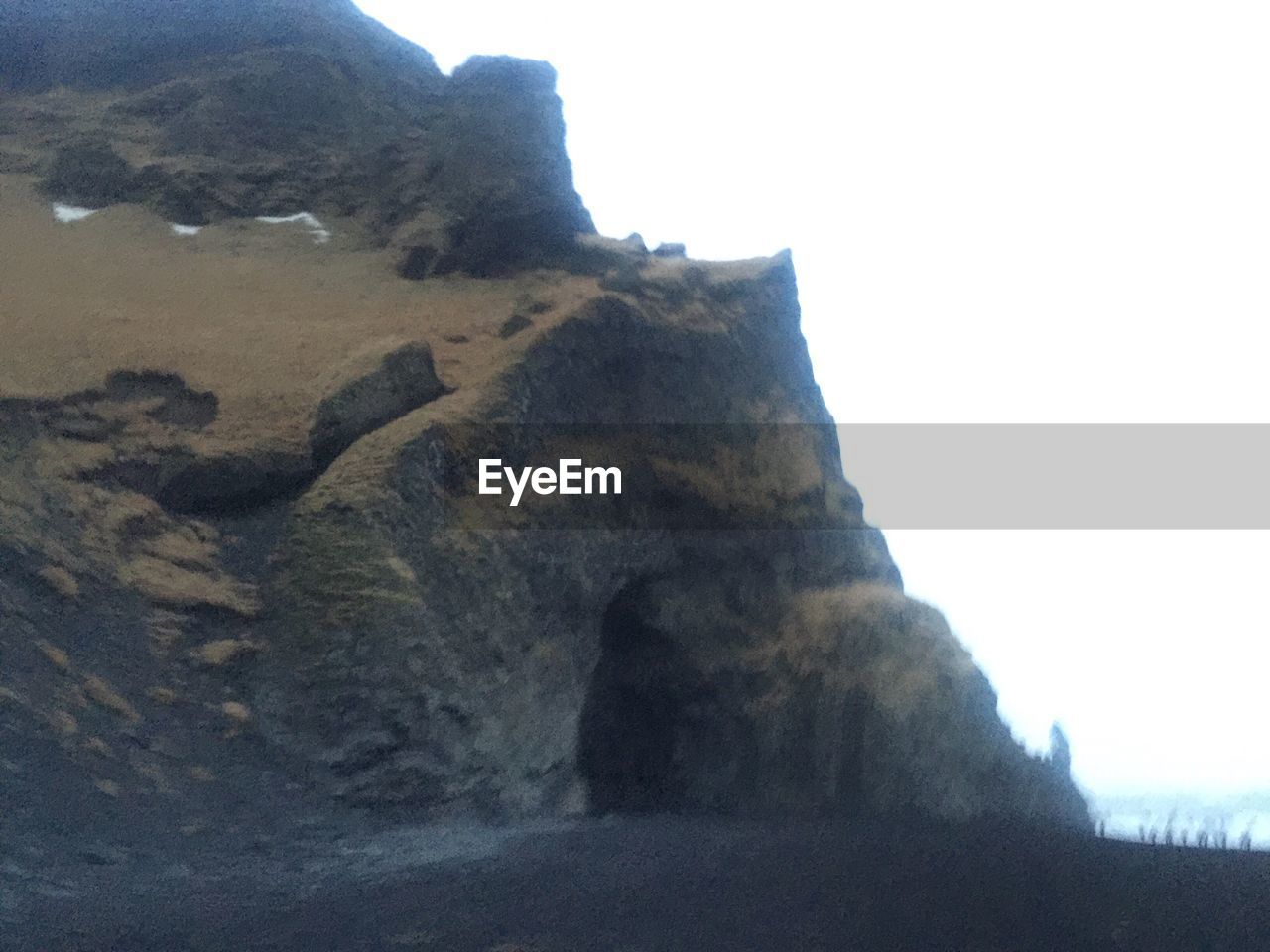 Low angle view of rock formation against clear sky