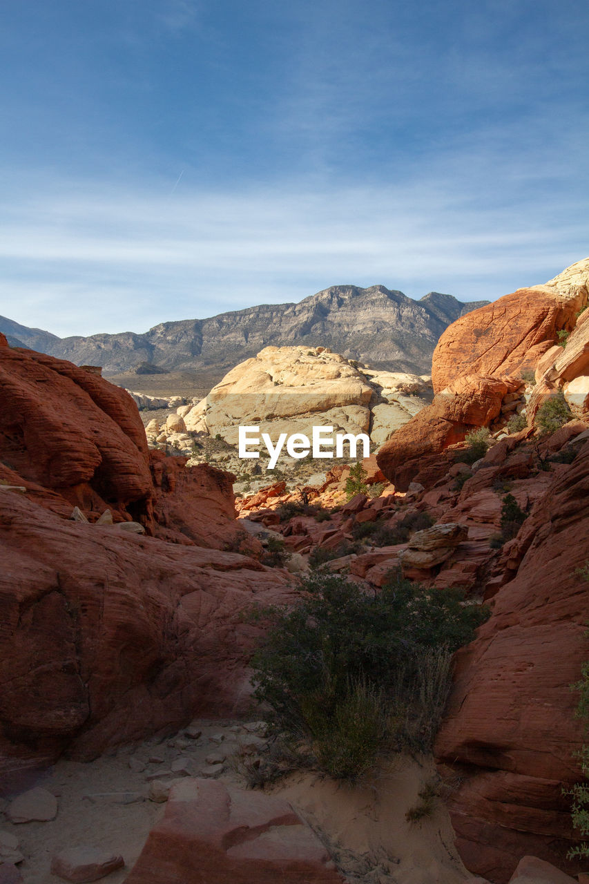 Scenic view of landscape and mountains against sky. red rock canyon, nevada 