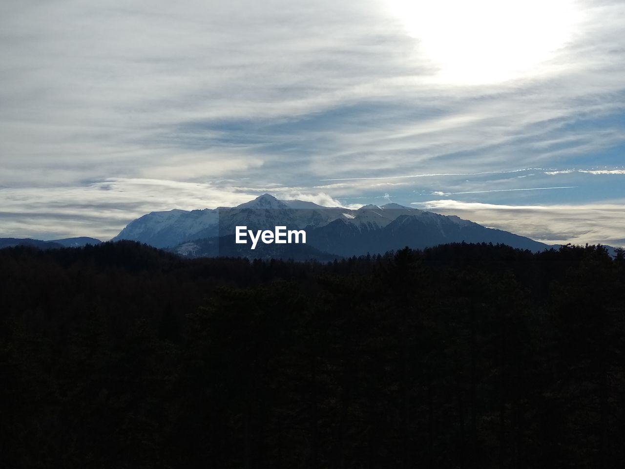 MOUNTAIN AGAINST SKY