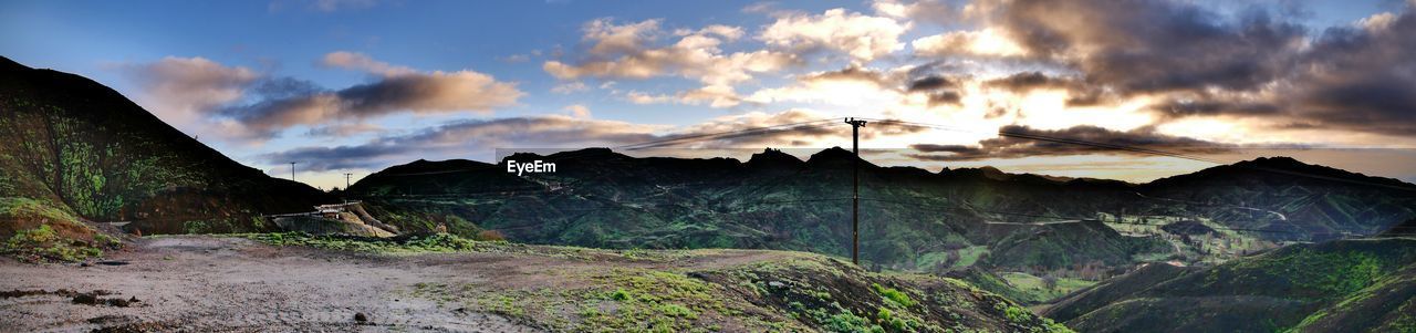 PANORAMIC VIEW OF LANDSCAPE AGAINST SKY DURING SUNSET