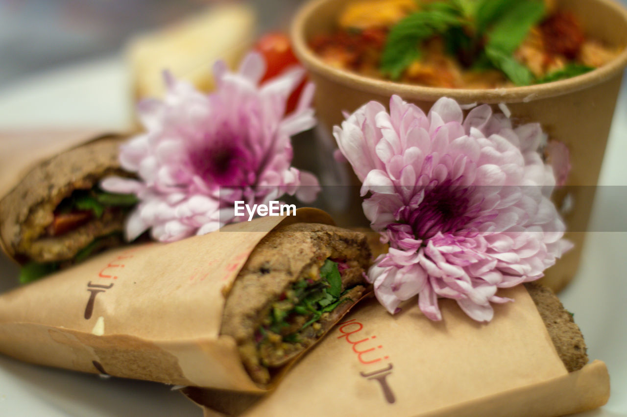 flower, flowering plant, food and drink, plant, food, freshness, no people, close-up, fast food, nature, indoors, beauty in nature, focus on foreground, asian food, wellbeing, healthy eating, selective focus, dish, vegetable, meal, flower arrangement, pink, celebration