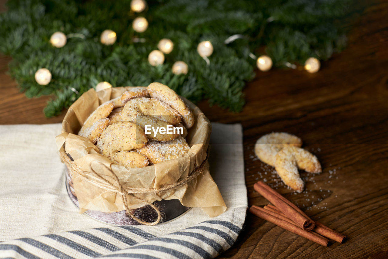 food and drink, food, plant, wood, freshness, tree, christmas, healthy eating, holiday, no people, nature, celebration, dessert, table, produce, rustic, christmas tree, baked, wellbeing, tradition, decoration, indoors, dish towel, still life, high angle view, christmas decoration, coniferous tree, pinaceae, basket