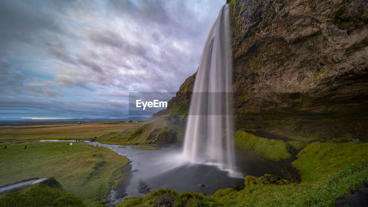 Cloudy evening at seljalandsfoss waterfall in southern iceland.