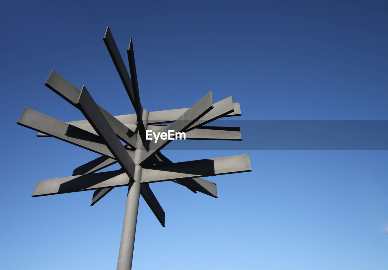 LOW ANGLE VIEW OF CLEAR BLUE SKY AGAINST THE BACKGROUND