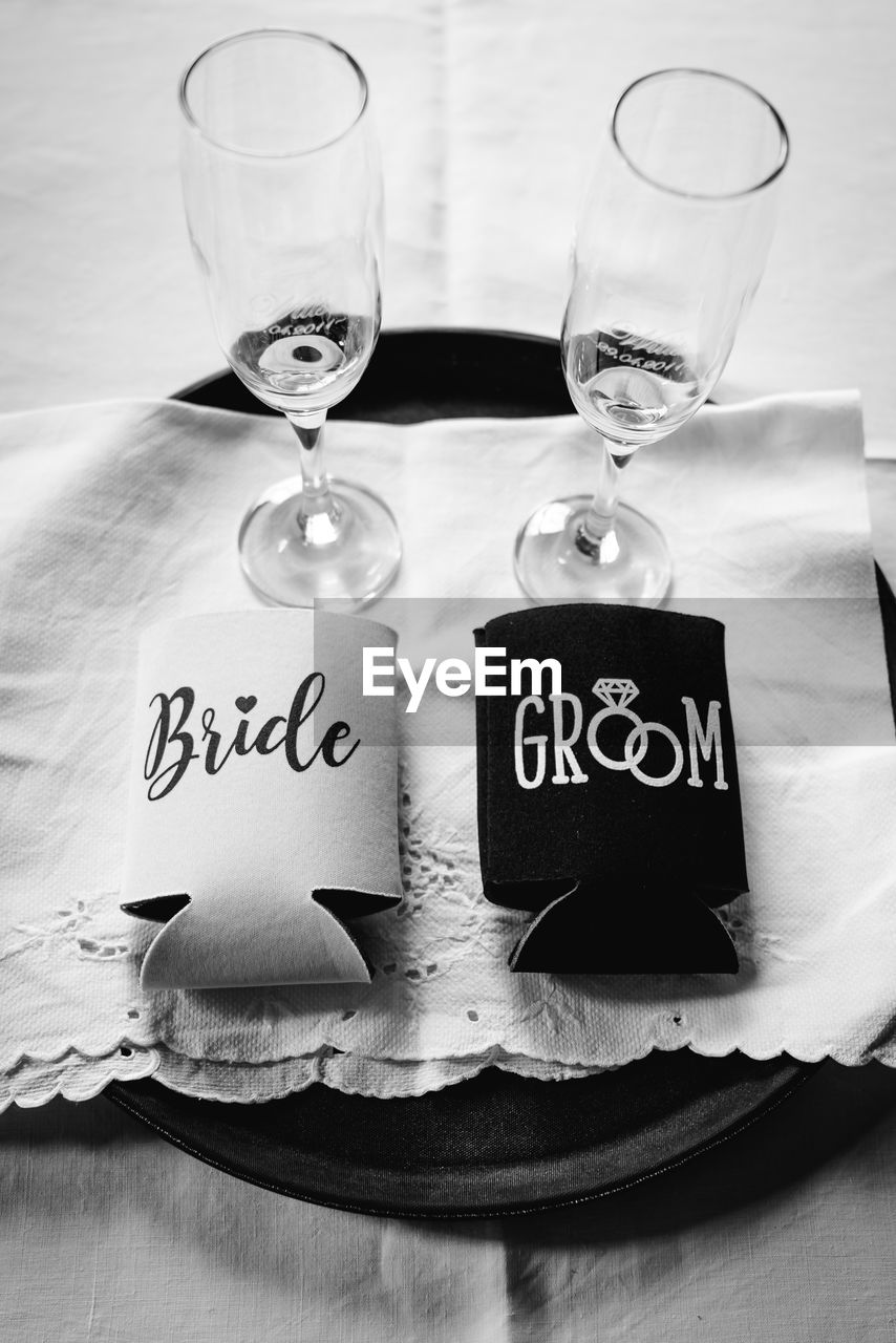 CLOSE-UP OF WINE GLASS WITH WINEGLASS ON TABLE