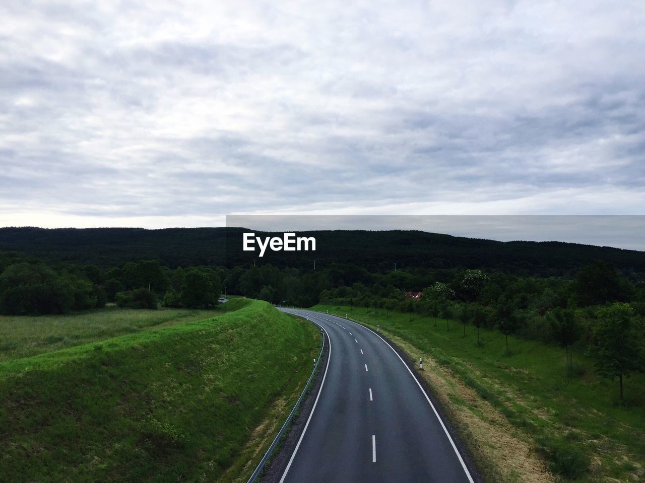 Country road passing through landscape