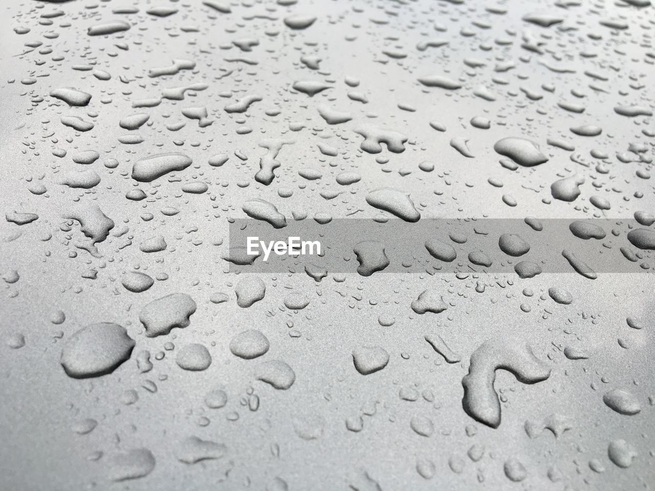 Close-up of water drops on glass window