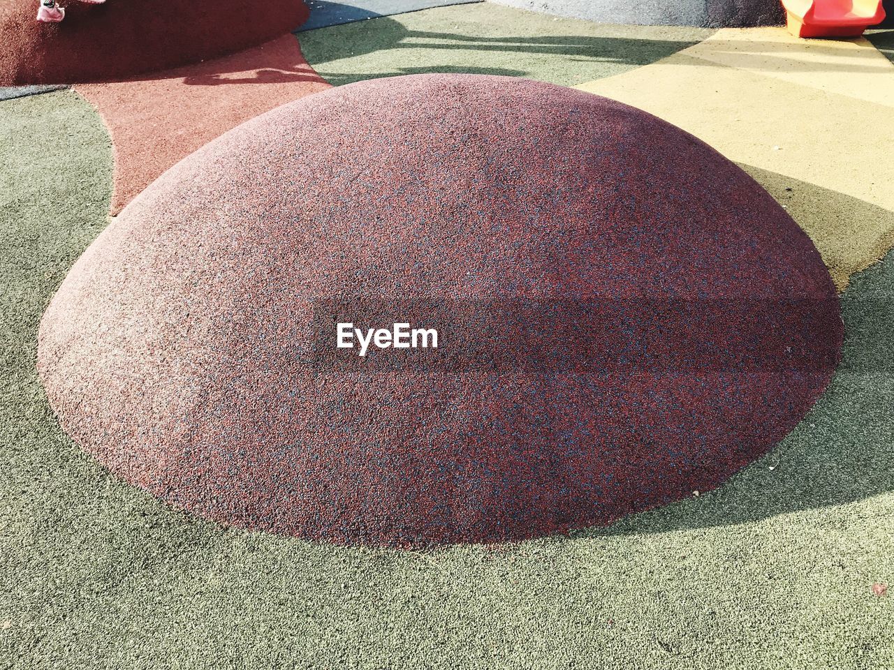 HIGH ANGLE VIEW OF SAND ON GROUND