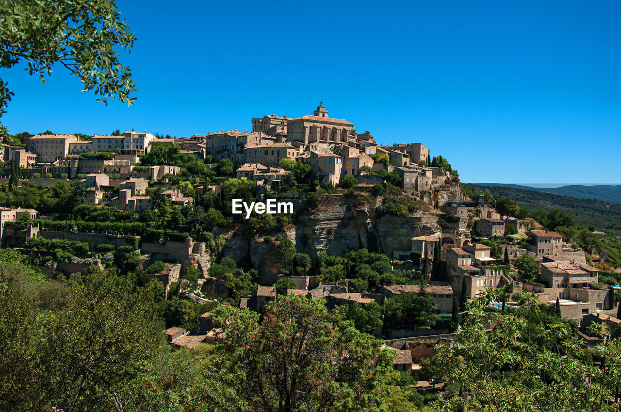Panoramic view of the gordes village on top of hill, in the french provence.