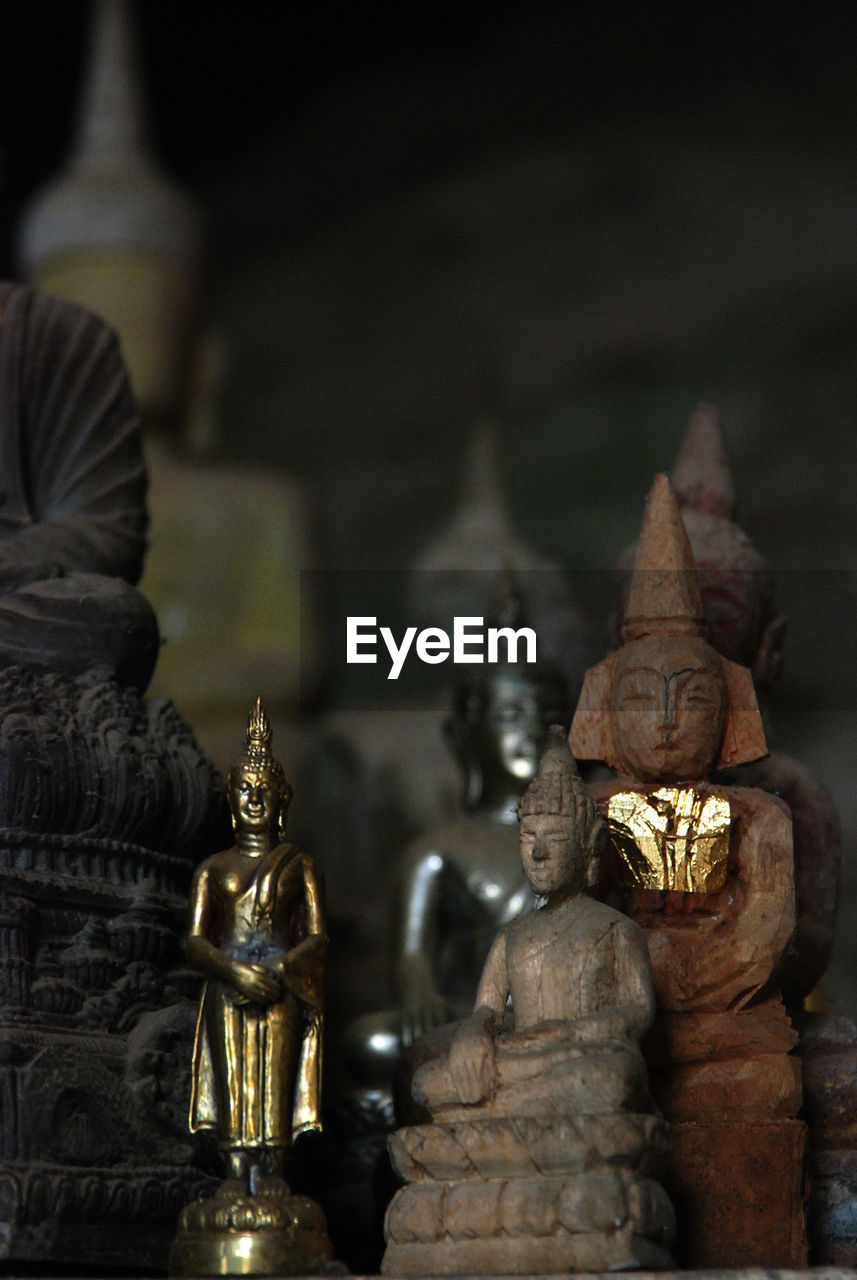 CLOSE-UP OF STATUE AT TEMPLE