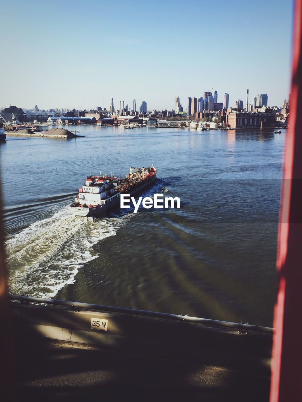 Cargo container in bay of water