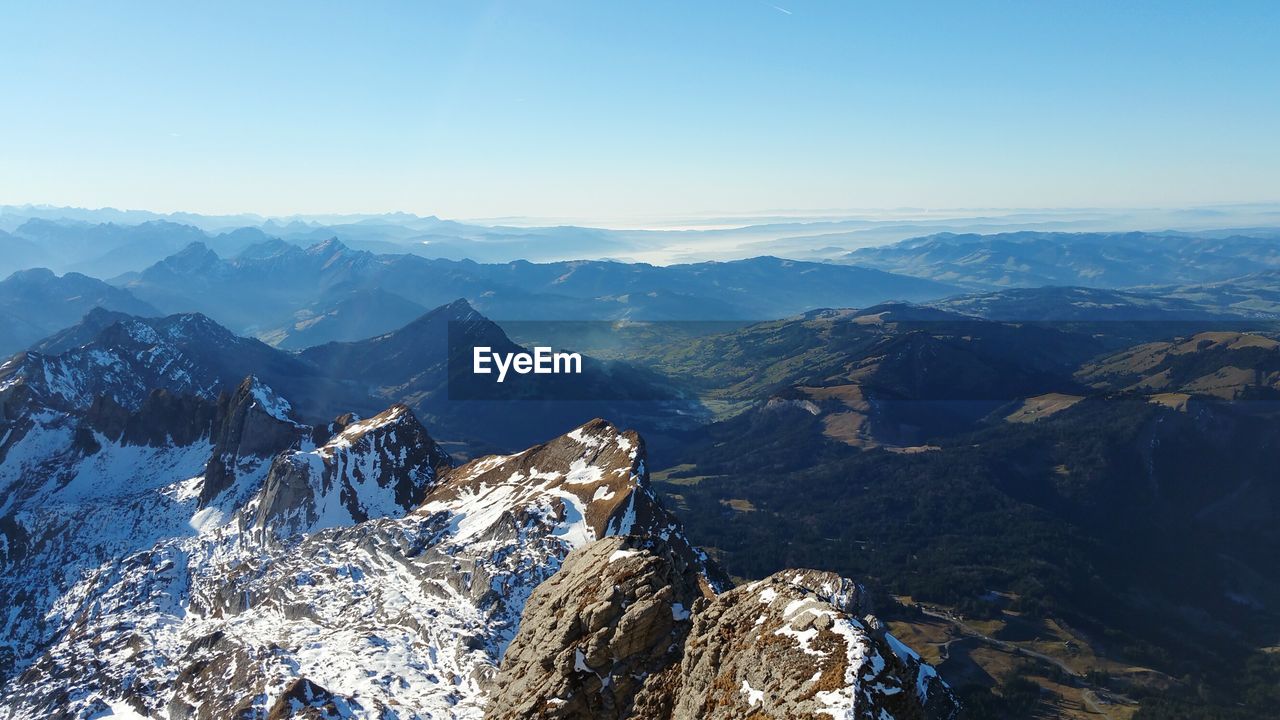 High angle view of mountains against clear sky