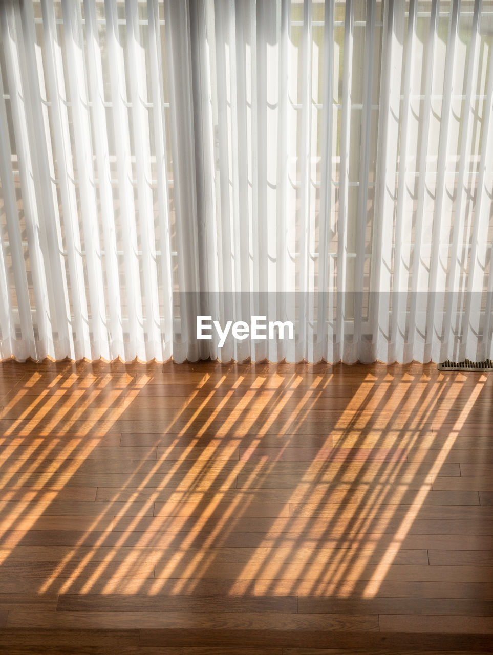 Installation of brazilian cherry hardwood flooring in room